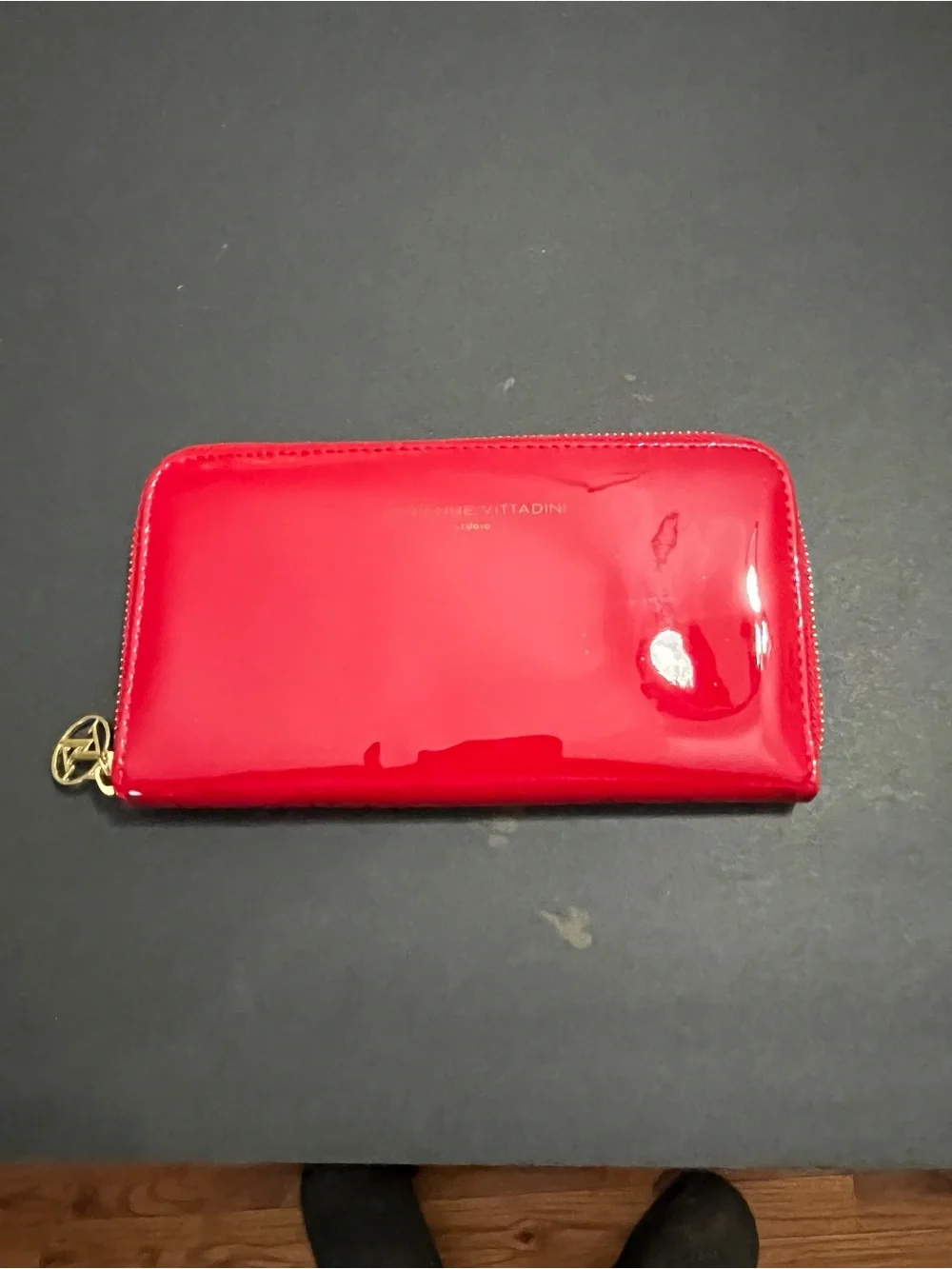 patent leather Adrienne Vittadini Studio Wallet featuring a zip-around
